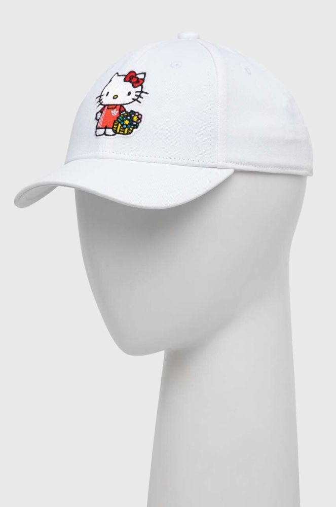 Дитяча бавовняна кепка adidas Originals x Hello Kitty колір білий з аплікацією