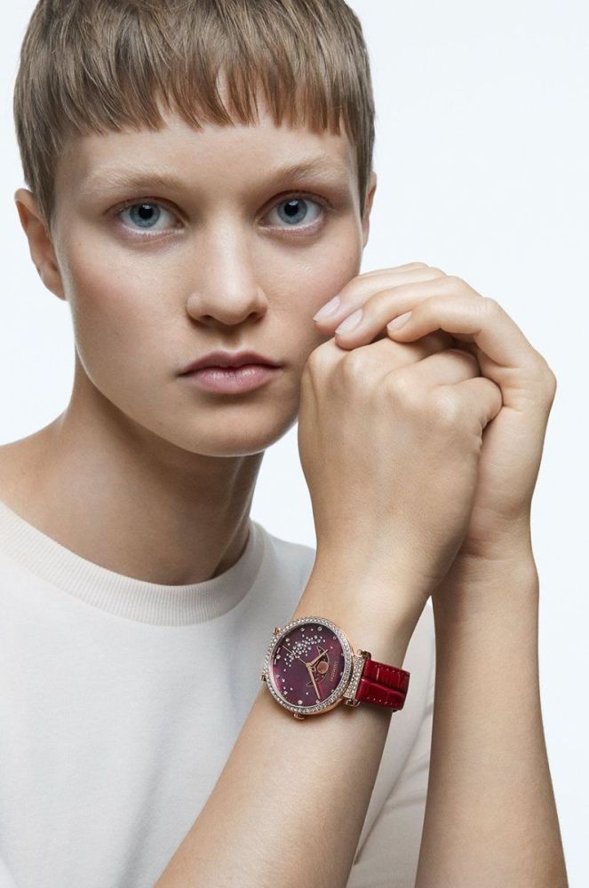 Годинник Swarovski 5613323 Passage Moon Phase жіночий колір червоний фото 5