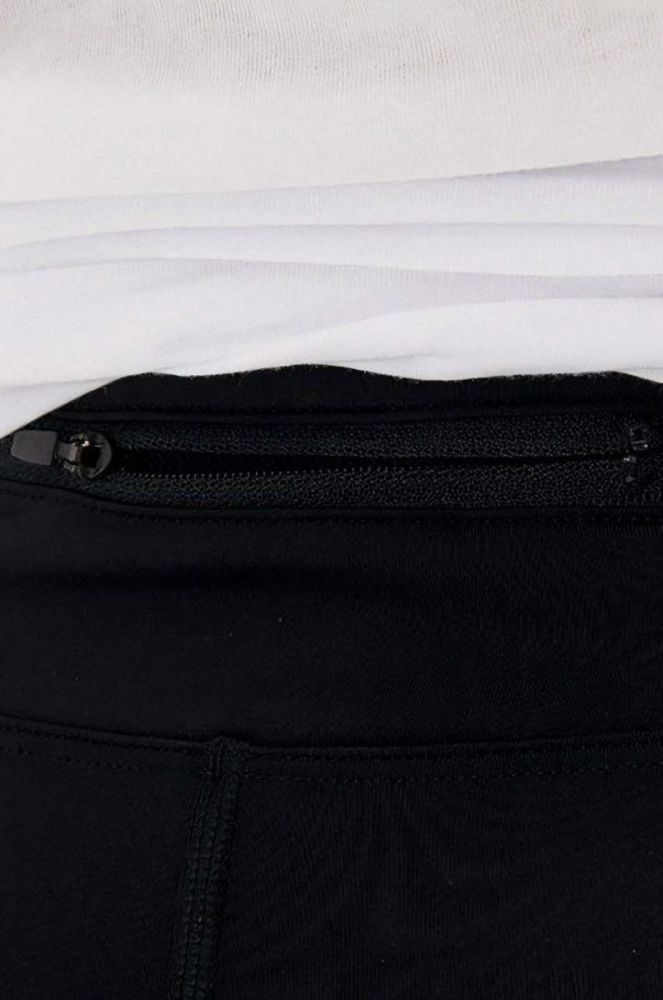 Легінси Under Armour Speedpocket Tight чоловічі колір чорний однотонні 1361489-001 фото 6