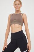 Бюстгальтер для йоги Reebok Studio Layered колір коричневий візерунок