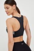 Спортивний бюстгальтер Reebok Modern Safari колір чорний візерунок (2884044)