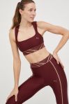 Спортивний бюстгальтер Puma Deco Glam колір бордовий Спортивний бюстгальтер Puma Deco Glam колір бордовий