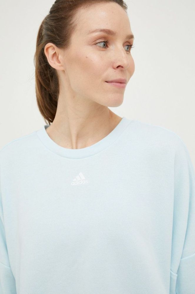 Тренувальна кофта adidas Studio жіноча  однотонна колір блакитний фото 4