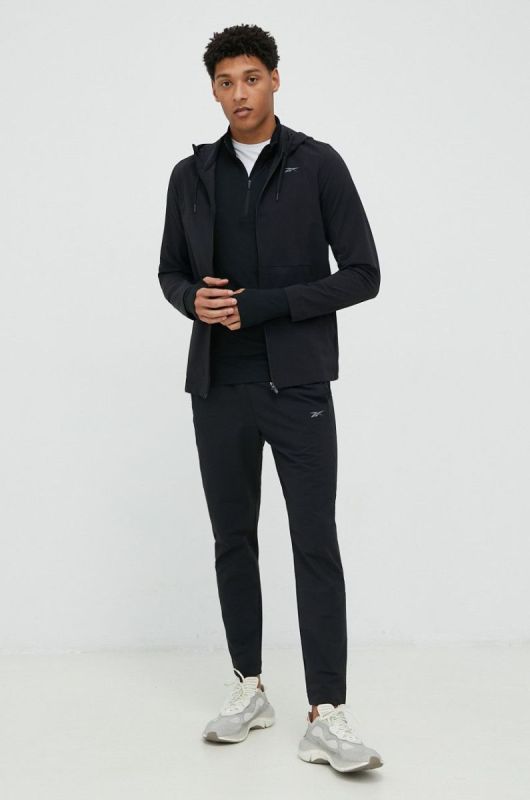 Лонгслів до бігу Reebok Quarter-zip колір чорний однотонний фото 2