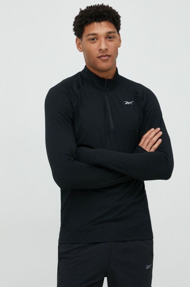Лонгслів до бігу Reebok Quarter-zip колір чорний однотонний фото 4