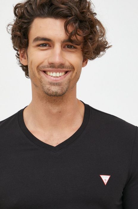 Лонгслів Guess чоловічий колір чорний однотонний (2558336)