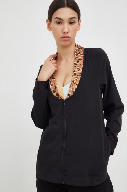 Куртка для тренувань Puma Safari Glam колір чорний перехідна