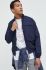 Куртка Superdry чоловіча колір синій перехідна oversize