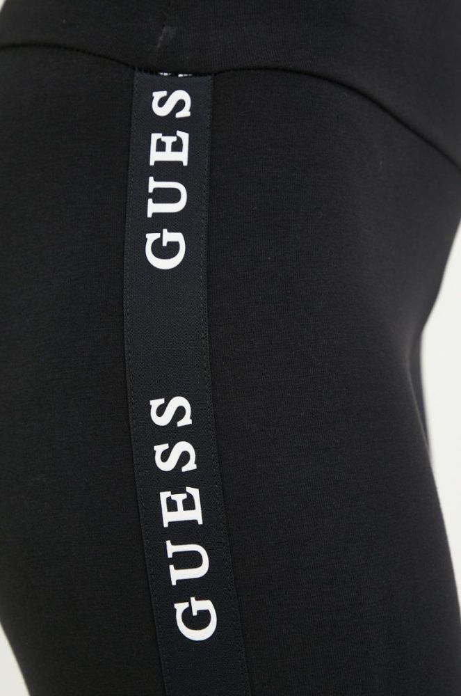 Легінси Guess жіночі колір чорний з принтом фото 4