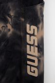 Дитячі легінси Guess колір сірий з принтом