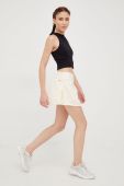 Спідниця adidas Performance колір бежевий mini розкльошена