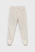 Дитячі спортивні штани Guess колір бежевий однотонні (2627128)