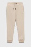 Дитячі спортивні штани Guess колір бежевий меланж Дитячі спортивні штани Guess колір бежевий меланж