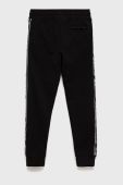 Дитячі спортивні штани Guess колір чорний з аплікацією (2420931)