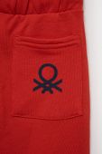 Дитячі бавовняні штани United Colors of Benetton колір червоний однотонні (2523108)