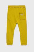 Дитячі бавовняні штани United Colors of Benetton колір зелений однотонні (2736959)