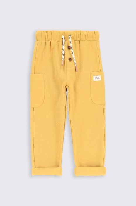 Дитячі спортивні штани Coccodrillo колір жовтий однотонні