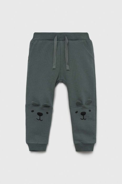 Дитячі спортивні штани Name it колір зелений з принтом