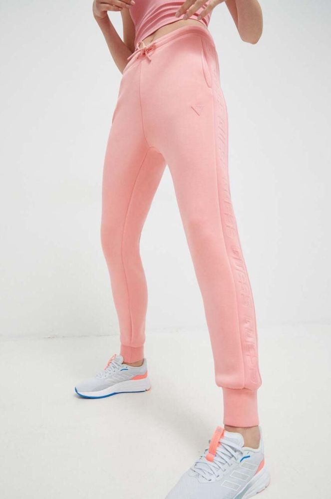 Спортивні штани Guess жіночі колір рожевий з принтом (2866721)