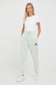 Спортивні штани adidas жіночі колір зелений з принтом