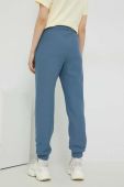 Спортивні штани Champion жіночі з аплікацією колір блакитний