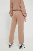 Спортивні штани Champion жіночі колір бежевий однотонні