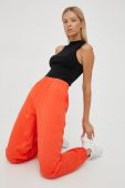 Бавовняні спортивні штани P.E Nation жіночі колір помаранчевий однотонні