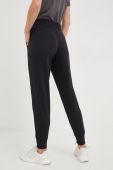 Спортивні штани Under Armour Armour Fleece жіночі колір чорний однотонні