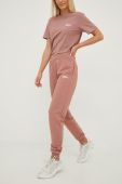 Бавовняні спортивні штани Jack Wolfskin жіночі колір рожевий однотонні (2576108)