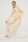 Спортивні штани Peak Performance жіночі колір бежевий однотонні (2765915)