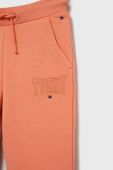 Дитячі спортивні штани Tommy Hilfiger колір помаранчевий з аплікацією