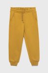 Дитячі бавовняні штани United Colors of Benetton колір жовтий однотонні (2737036)