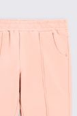 Дитячі бавовняні штани Coccodrillo колір рожевий однотонні (2701660)