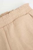 Дитячі спортивні штани Coccodrillo колір бежевий однотонні (3584906)