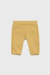Дитячі бавовняні штани United Colors of Benetton колір жовтий з аплікацією