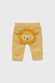 Дитячі бавовняні штани United Colors of Benetton колір жовтий з аплікацією