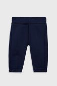 Дитячі бавовняні штани United Colors of Benetton колір синій з аплікацією