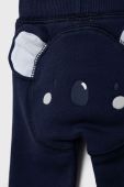 Дитячі бавовняні штани United Colors of Benetton колір синій з аплікацією