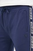 Спортивні штани Guess колір синій з принтом