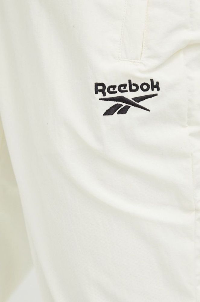 Спортивні штани Reebok Classic чоловічі колір бежевий з принтом фото 4