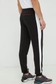 Спортивні штани Puma Puma X Coca Cola чоловічі колір чорний візерунок