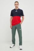 Штани для тренувань adidas Performance чоловічі колір зелений з принтом
