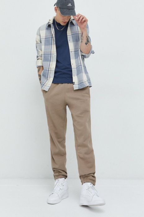 Бавовняні спортивні штани adidas Originals чоловічі колір бежевий однотонні