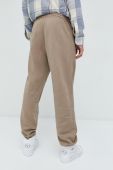 Бавовняні спортивні штани adidas Originals чоловічі колір бежевий однотонні