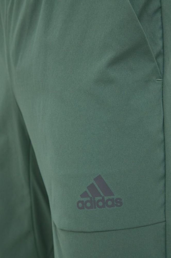 Спортивні штани adidas чоловічі колір зелений однотонні (2496846) фото 4