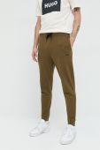 Бавовняні спортивні штани HUGO чоловічі колір зелений однотонні