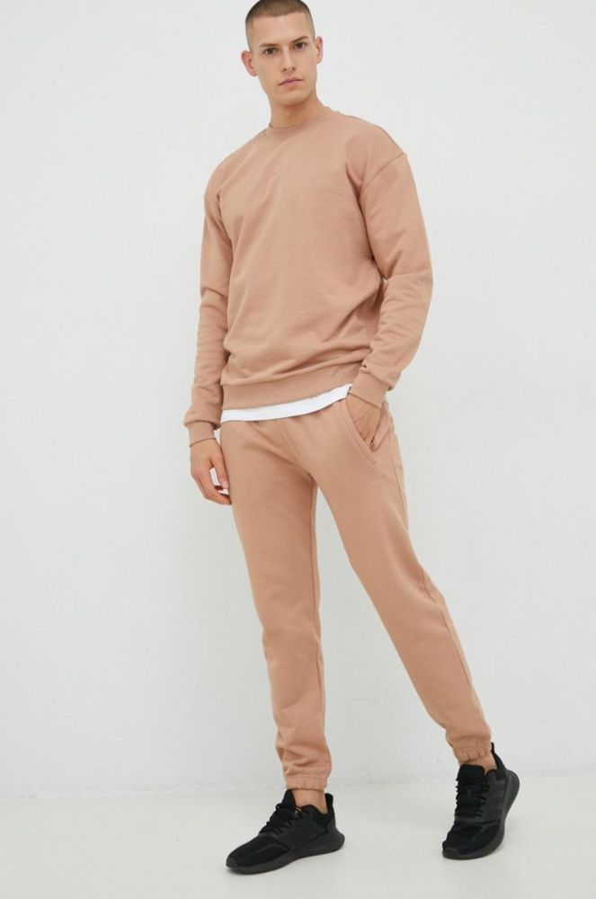 Бавовняні спортивні штани Arkk Copenhagen unisex колір бежевий однотонні фото 8