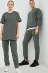 Бавовняні спортивні штани Arkk Copenhagen unisex колір зелений однотонні Бавовняні спортивні штани Arkk Copenhagen unisex колір зелений однотонні