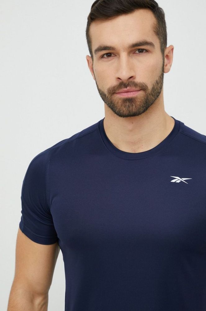 Тренувальна футболка Reebok Tech колір синій однотонна фото 4
