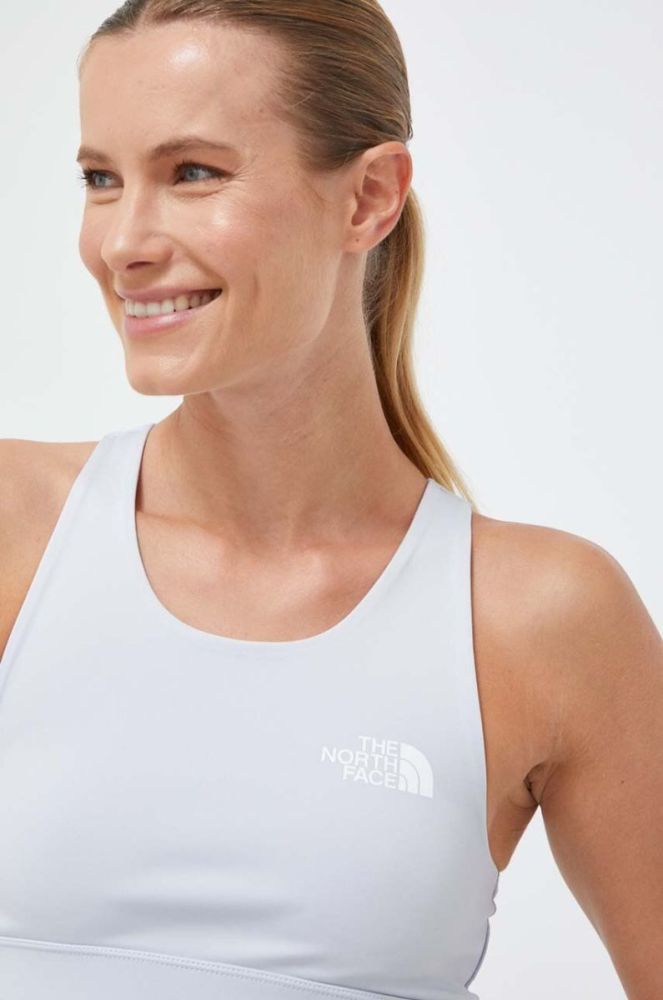Спортивний бюстгальтер The North Face Flex однотонний колір блакитний фото 4